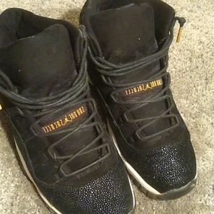 Black and gold Jordan 11 barley used